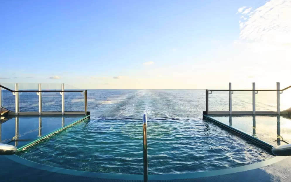 Explora Journeys EXPLORA III Astern Pool & Bar 9.jpg